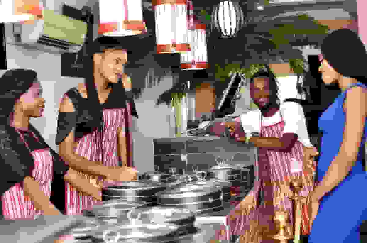 Group of caterers at an event, highlighting the importance of insurance coverage for part-time workers in small businesses like catering services